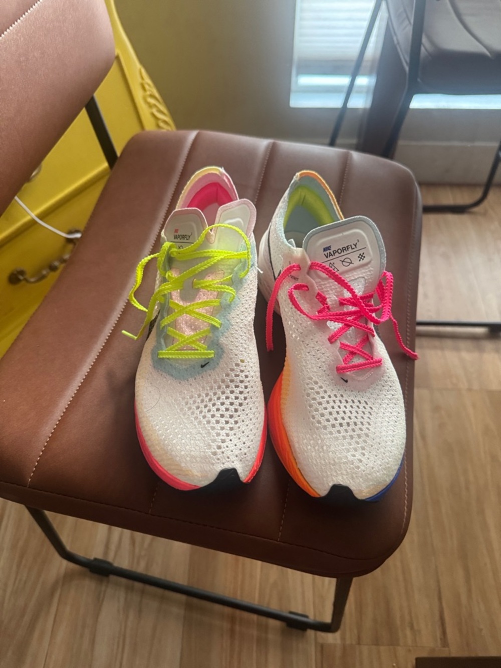 Nike White vaporfly running shoes with Neon Pink & Neon Yellow Laces